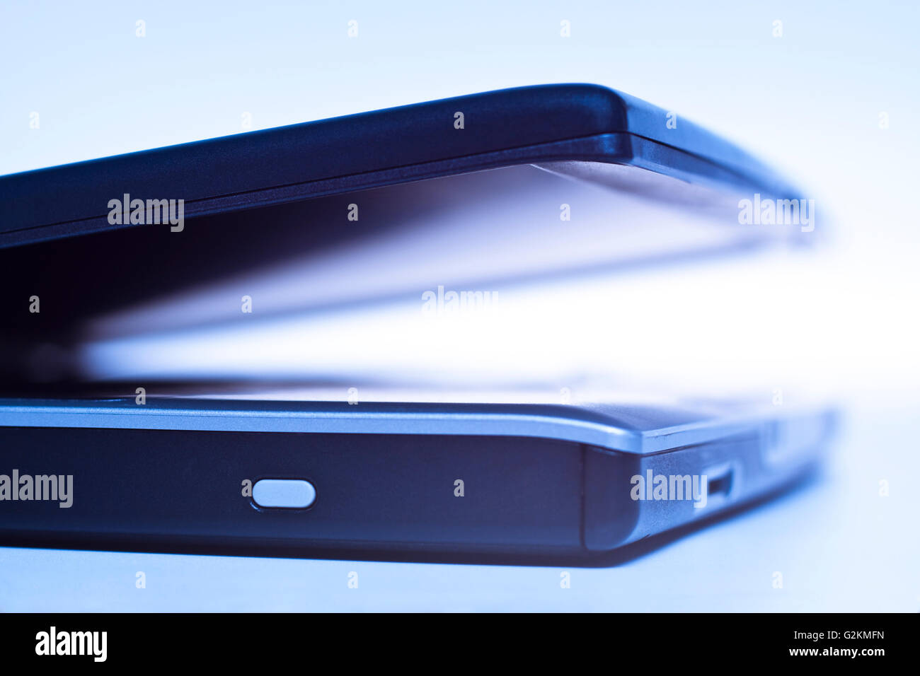 laptop closeup with blue lightning and depth of field efect Stock Photo