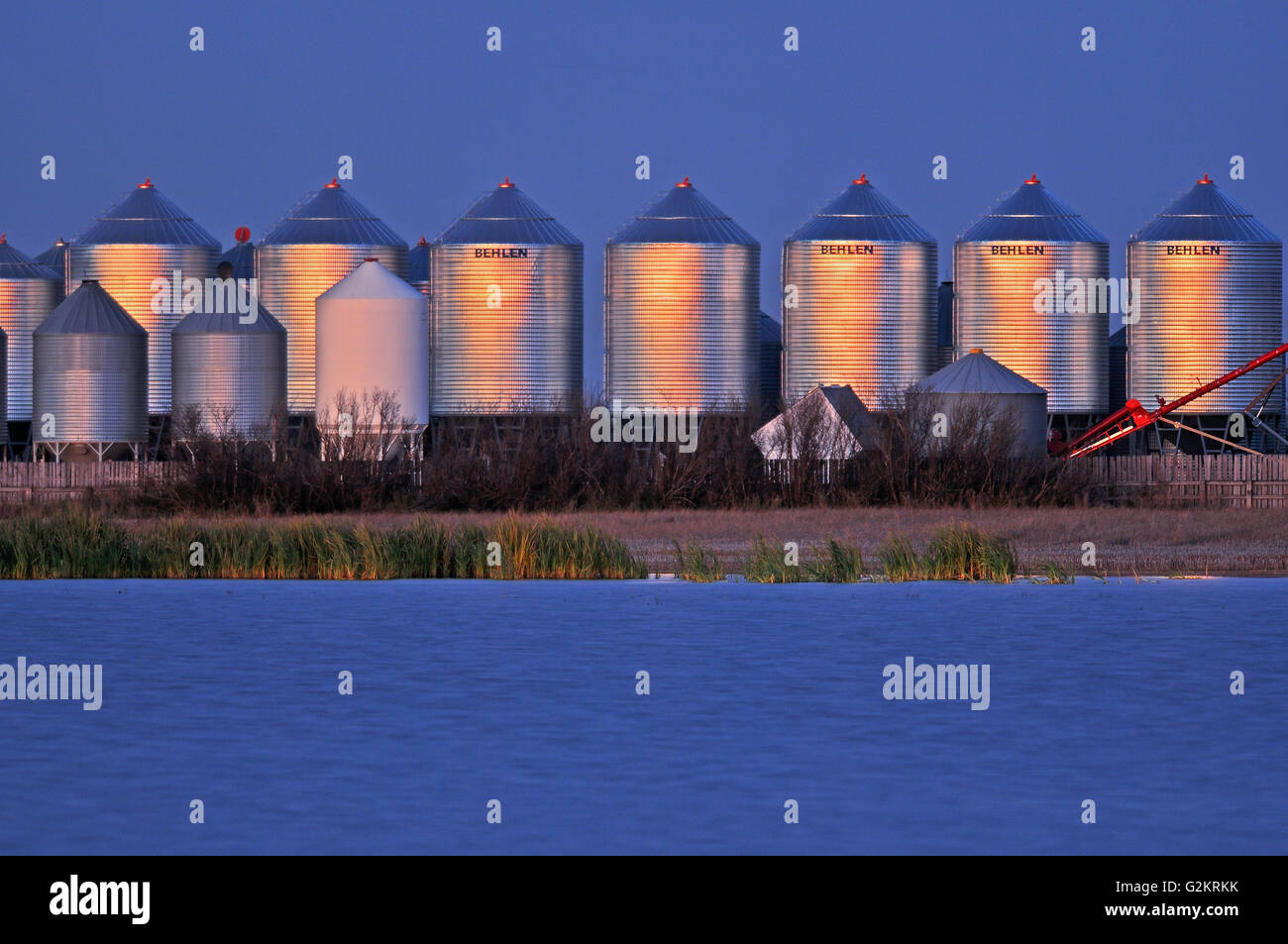 Grain bins at dusk Tuxford Saskatchewan Canada Stock Photo