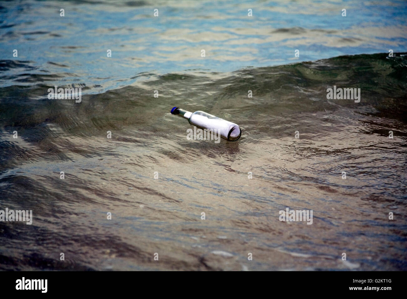 Message in Bottle at Sea Stock Photo Alamy