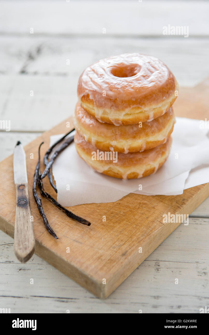 Glazed Donuts and Vanilla Beans Stock Photo Alamy