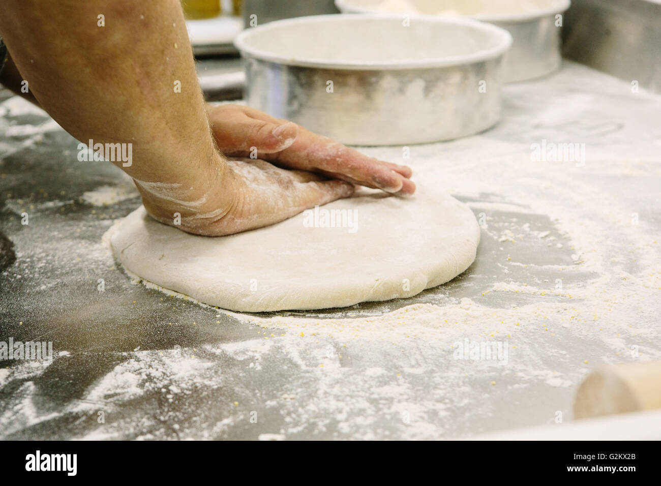 Baker's Hands Flattening Dough Stock Photo Alamy