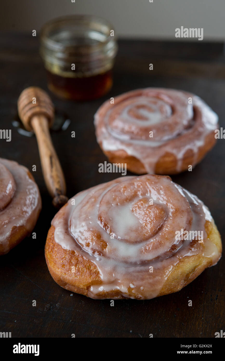 Glazed Cinnamon Buns with Honey Stock Photo Alamy