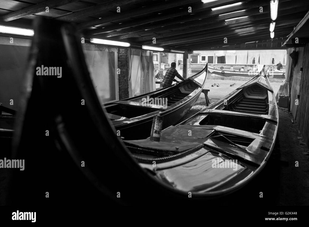 Man Repairing Gondolas, Venice, Italy Stock Photo Alamy