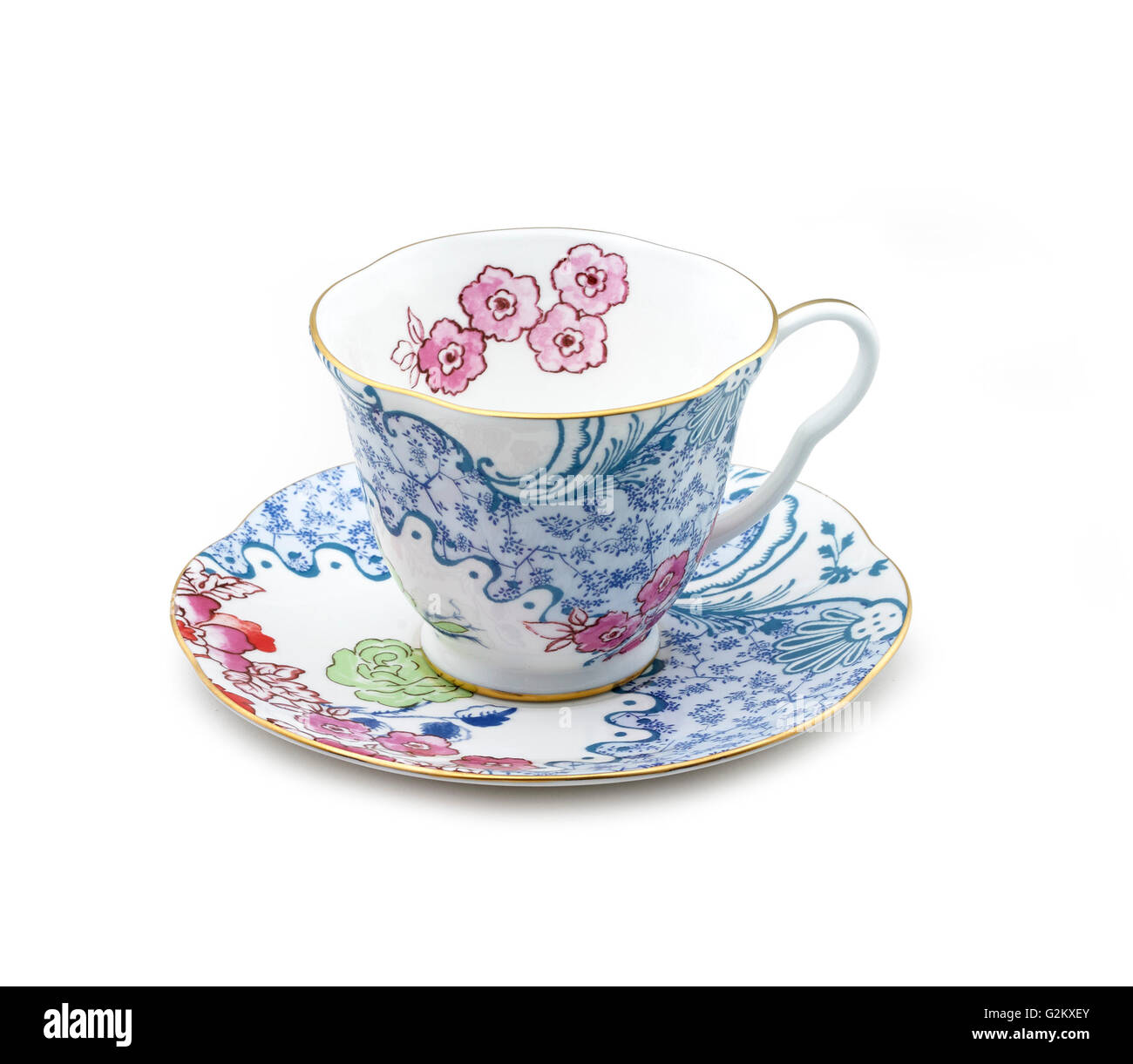 Patterned china teacup saucer white background Stock Photo