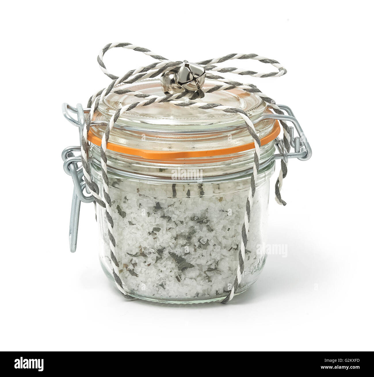 Glass jar salt white background bound with string Stock Photo