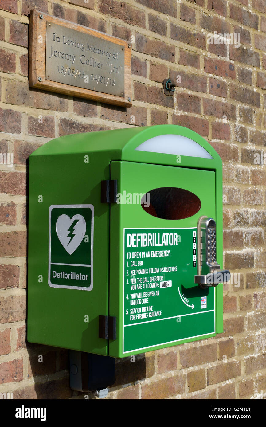Wall Mounted Emergency Defibrillator in Village Stock Photo Alamy