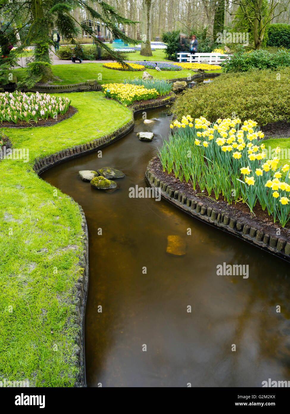 Visitors walk through and enjoy the many different flower displays at