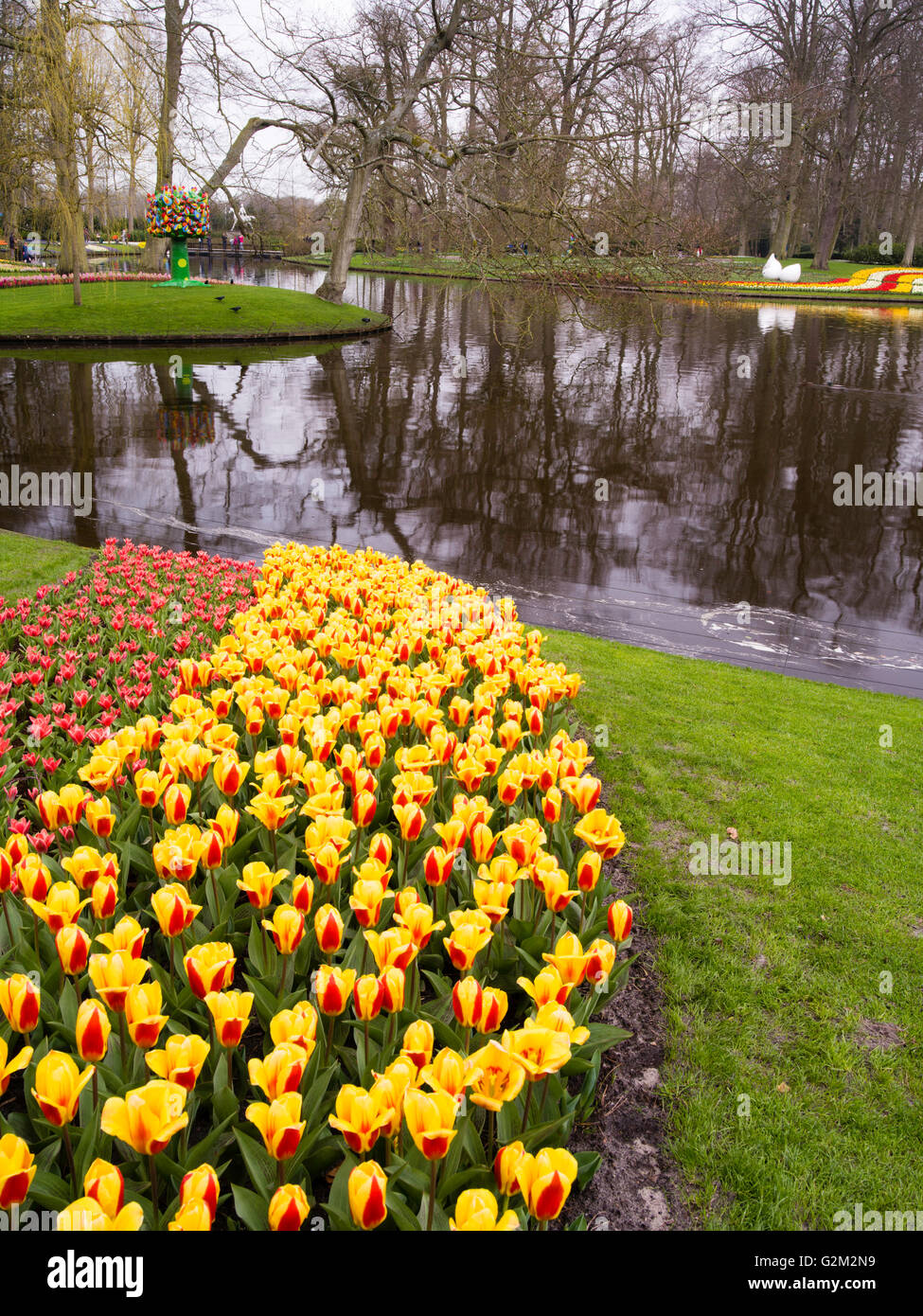 Visitors walk through and enjoy the many different flower displays at