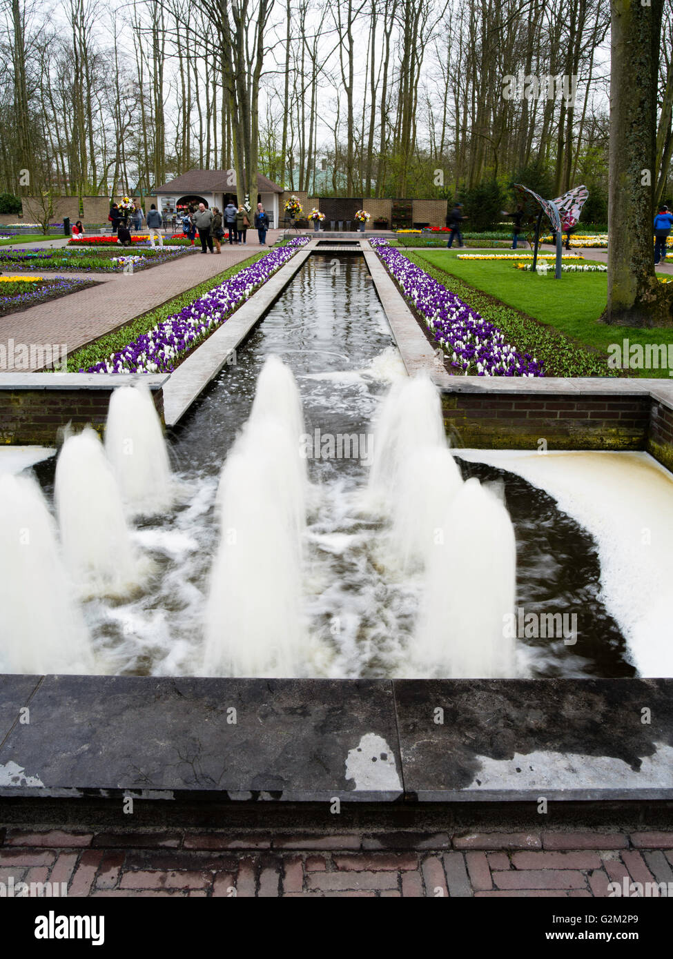 Visitors walk through and enjoy the many different flower displays at