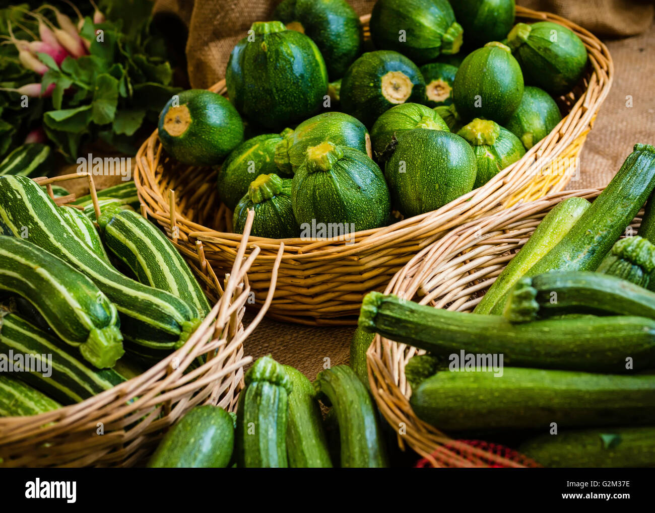 Baskets of Zucchini Squash at the Farmers Market Stock Photo