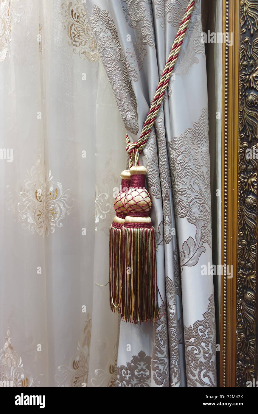 Classic curtain hanging on a window Stock Photo