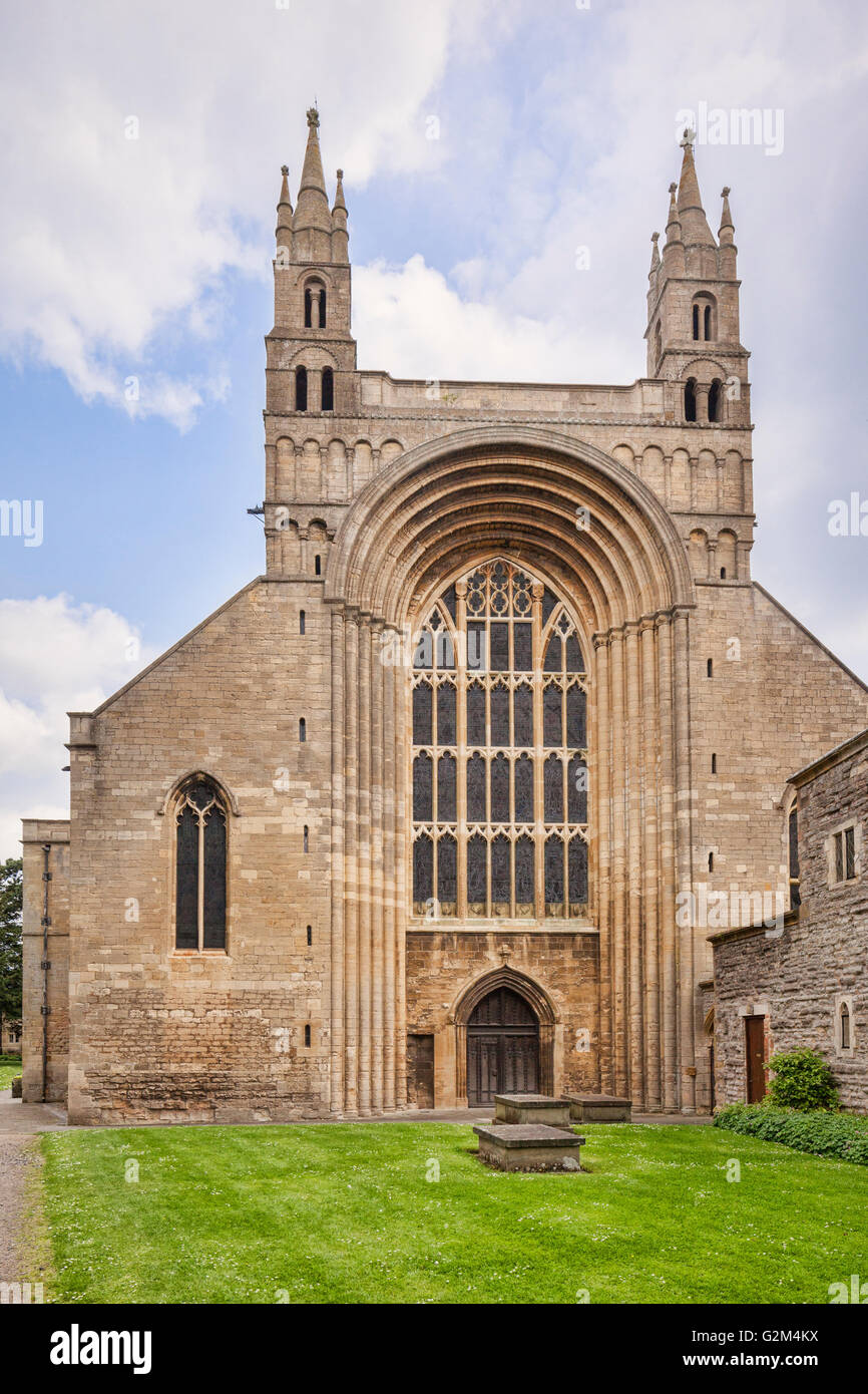 The west facade with a tall Norman arch of the Abbey Church of St Mary the Virgin, Tewkesbury, Gloucestershire, England. Stock Photo