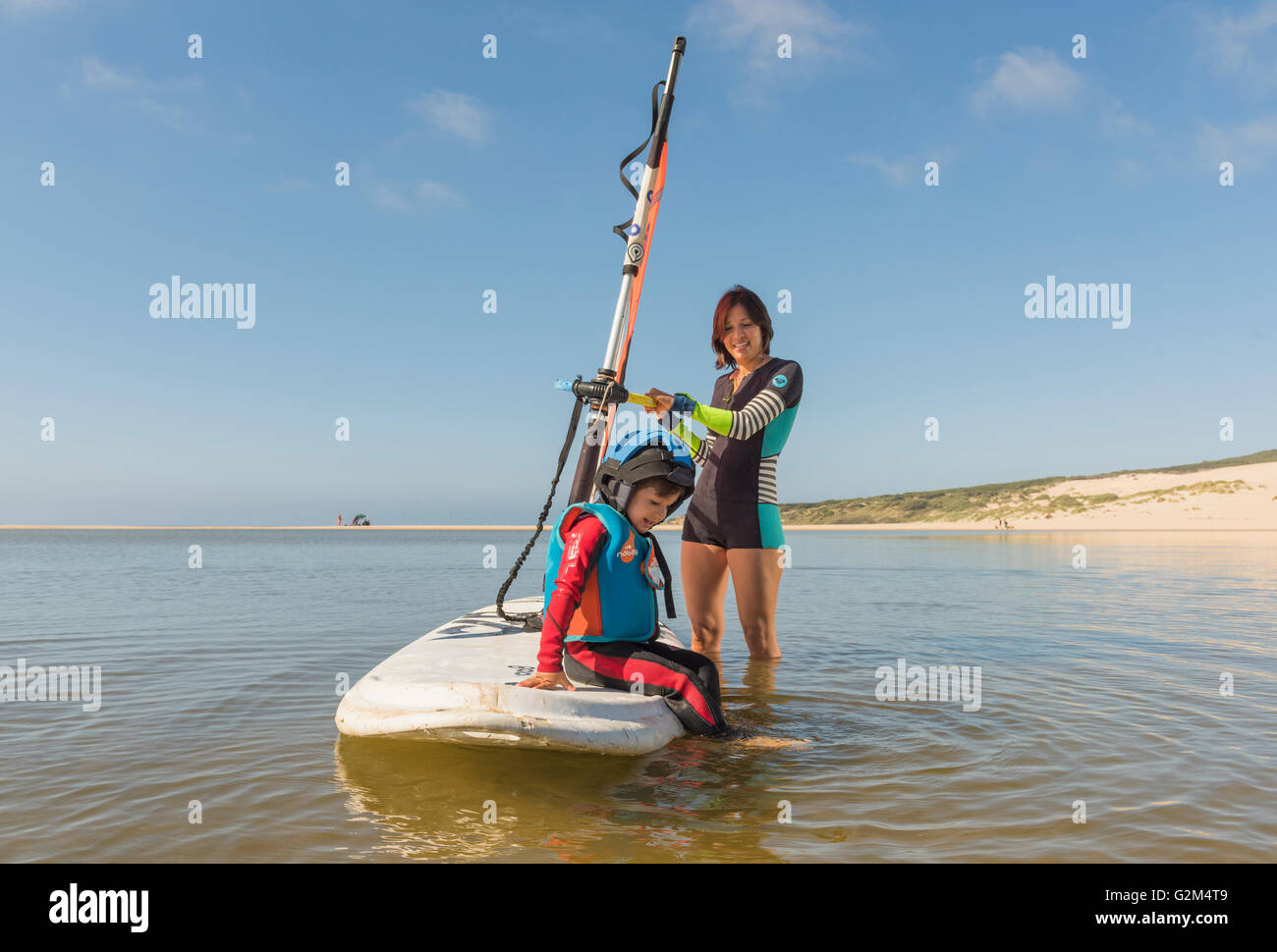 Child having a windsurfing lesson. Valdevaqueros beach, Tarifa, Cadiz