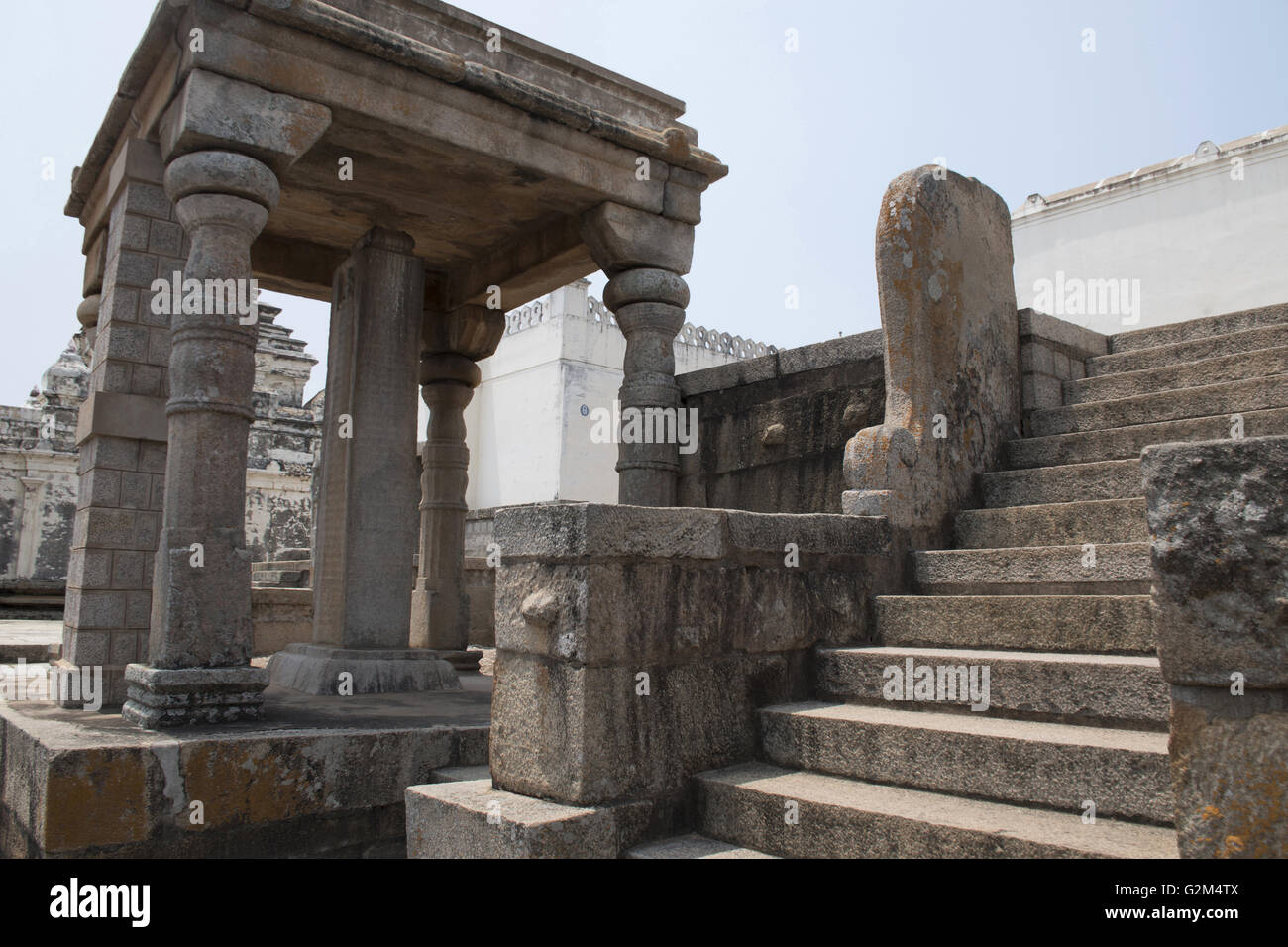 Carved inscriptions in Kannada on the stone pillar at the entrance of Eradukatte Basadi