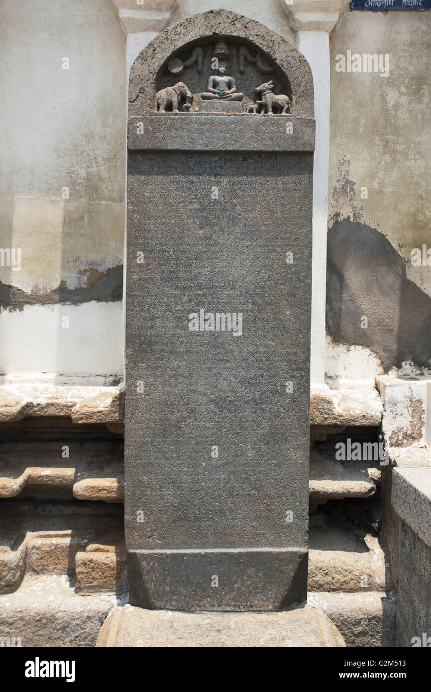 Carved inscriptions in Kannada on the stone pillar, entrance of Shasana