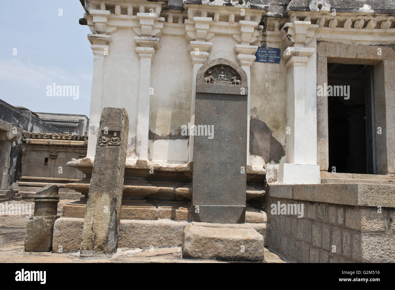 Carved inscriptions in Kannada on the stone pillar at the entrance of Shasana Basadi Chandragiri