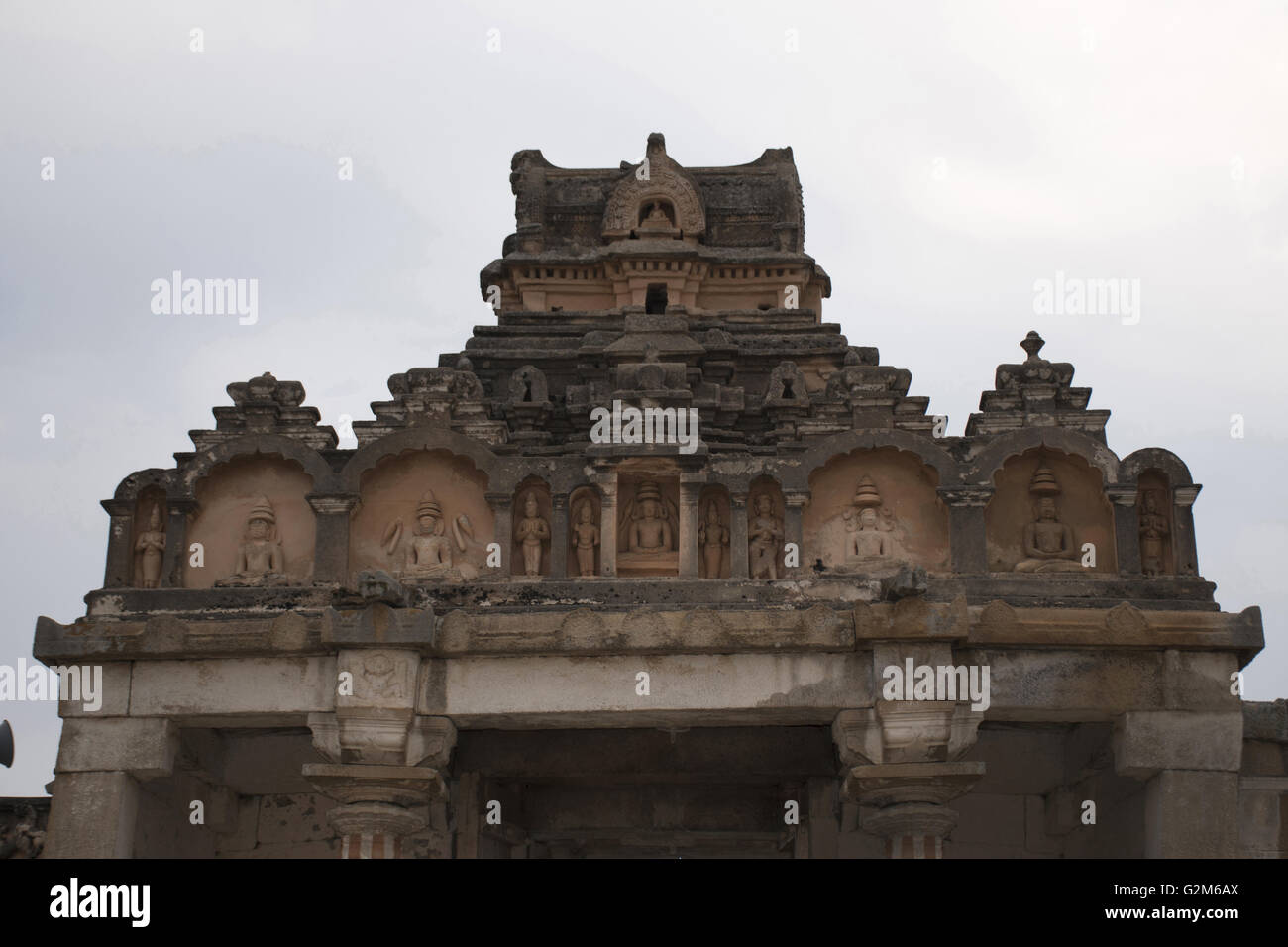 Carved figures at the top of the entrance, Gomateshwara temple