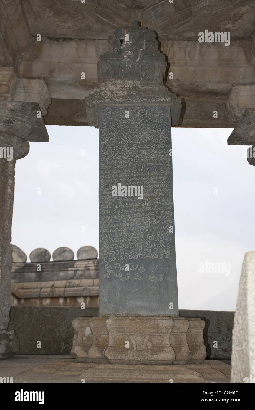 Inscriptions in Kannada carved on a pillar, Gomateshwara temple, Vindhyagiri Hill