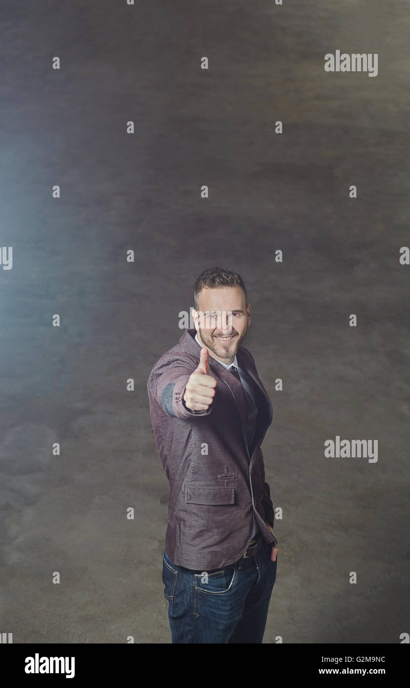 Smiling business man standing outside office building Stock Photo - Alamy