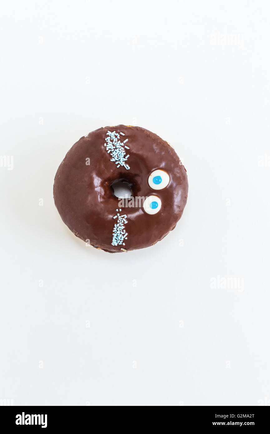Donut with sprinkles isolated on white background Stock Photo - Alamy