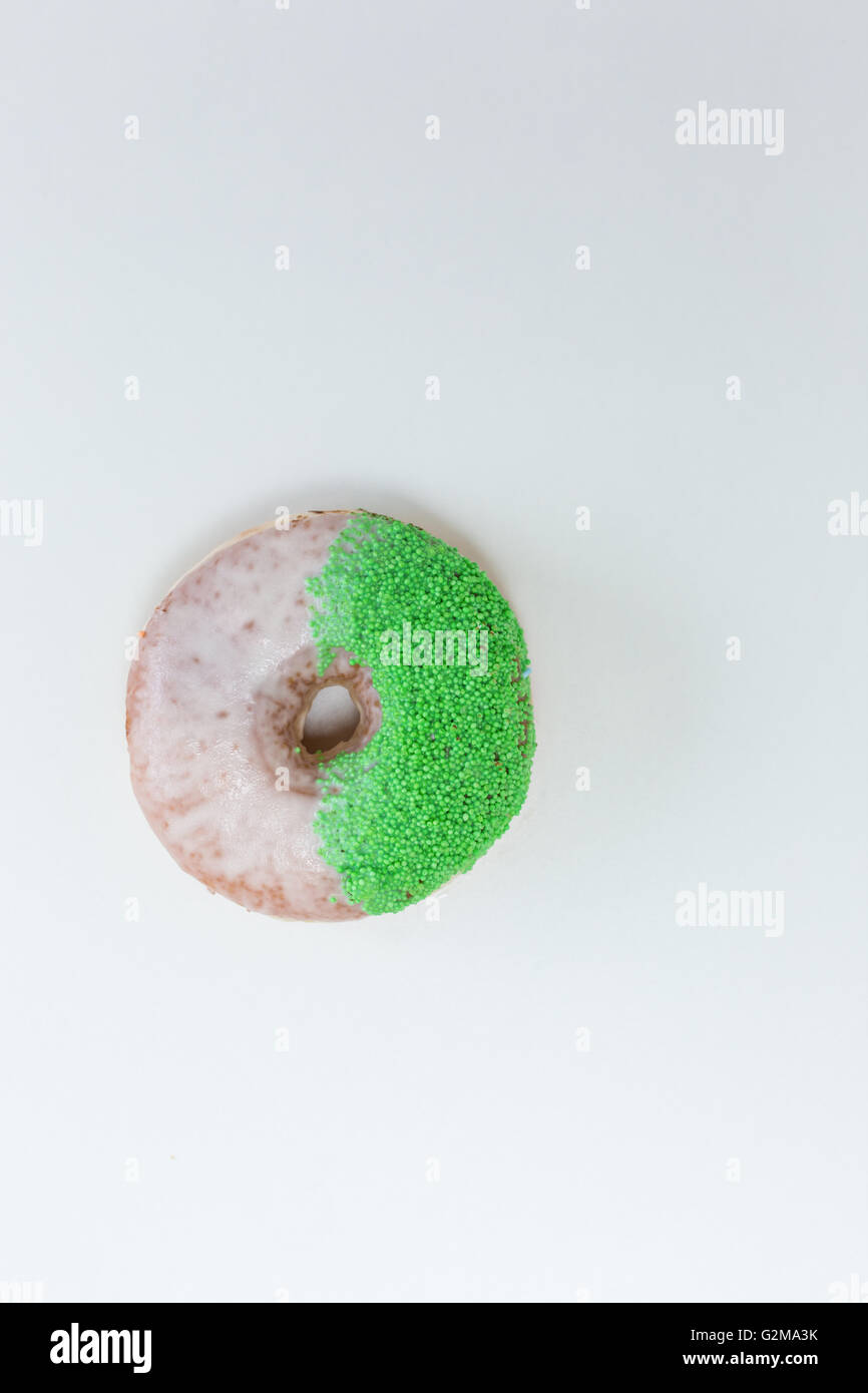 Donut with sprinkles isolated on white background Stock Photo - Alamy