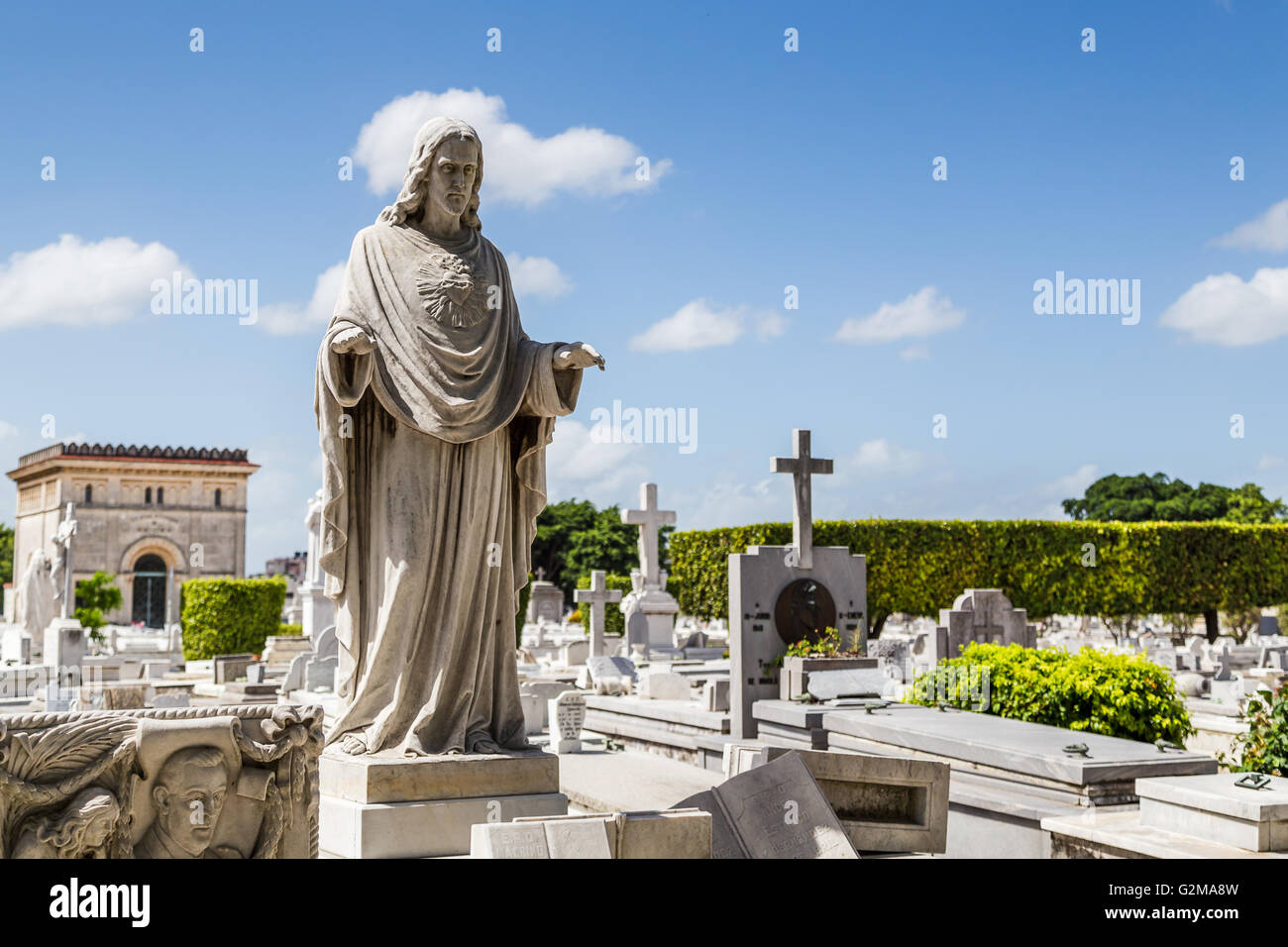 A statue on one of the 800,000 graves in the  Christopher Columbus cemetery in Havana. Stock Photo