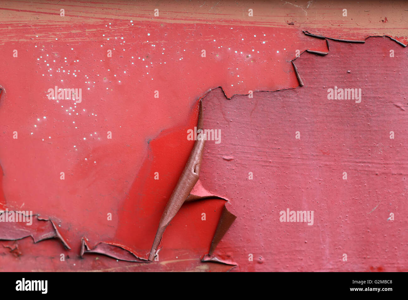 Flaking paint from the metal surface Stock Photo