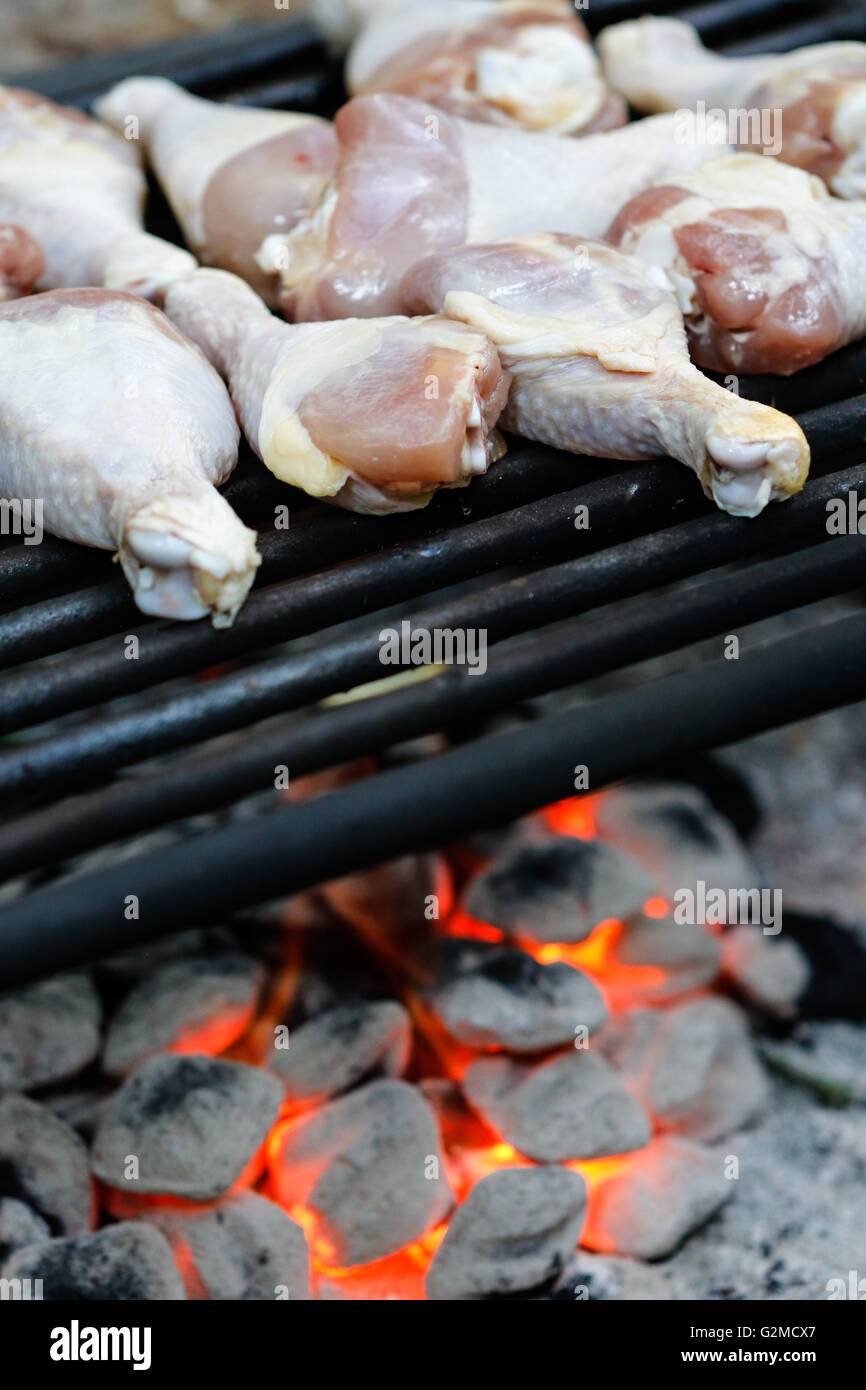 BBQing chicken at the campsite Stock Photo Alamy