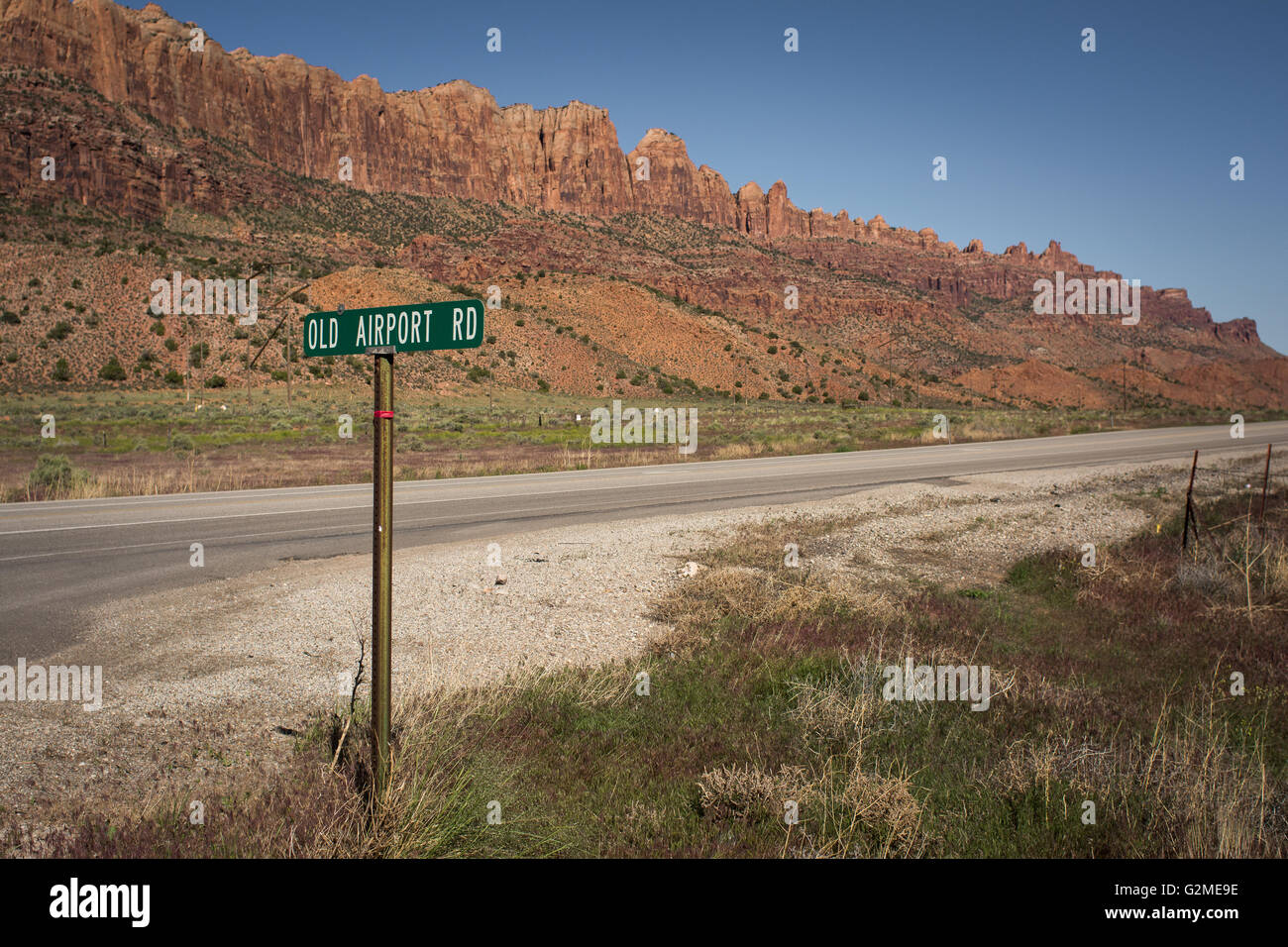 Old Airport Road sign and geological formations in Moab, Utah, USA Stock Photo