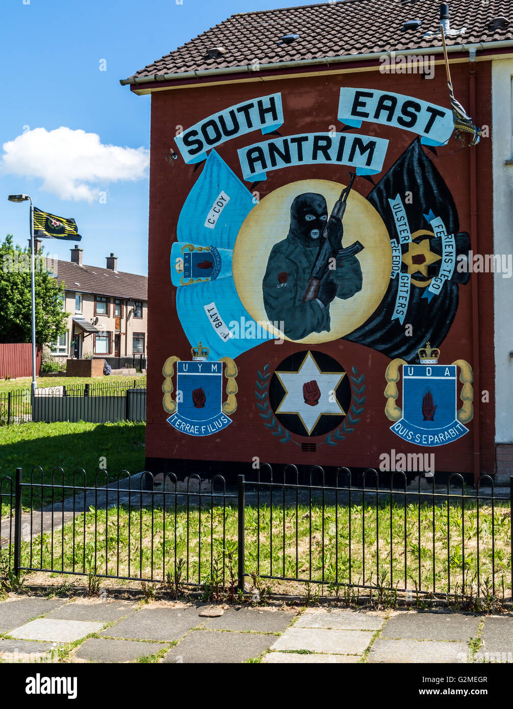 South East Antrim UFF UDA mural in loyalist Monkstown estate. Stock Photo