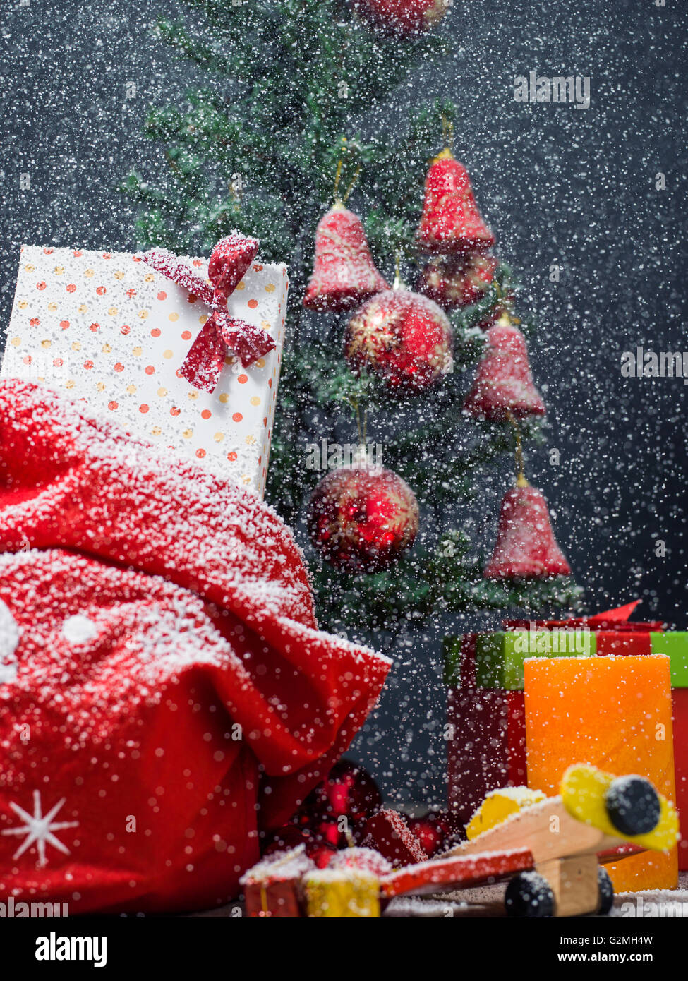 Photo of luxury gift boxes under Christmas tree, New Year home