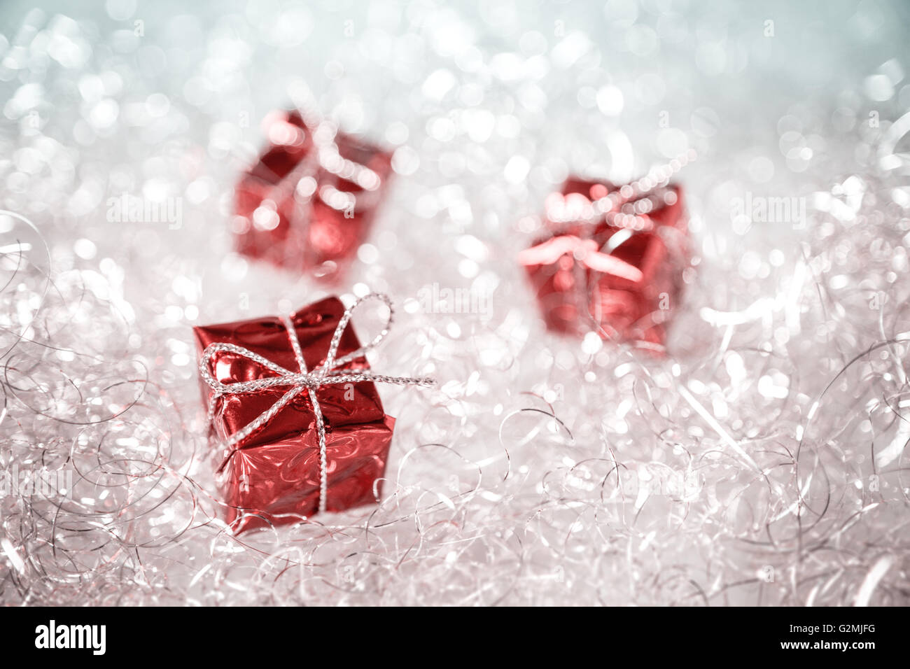 Three Christmas presents  in vintage look. Stock Photo