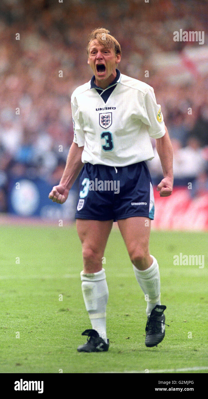 File photo dated 22-06-1996 of Stuart Pearce exorcises the ghosts of penalties past as he forcibly celebrates after scoring in the penalty shoot-out to decide the Euro 96 quarter final clash against Spain, at Wembley. Stock Photo