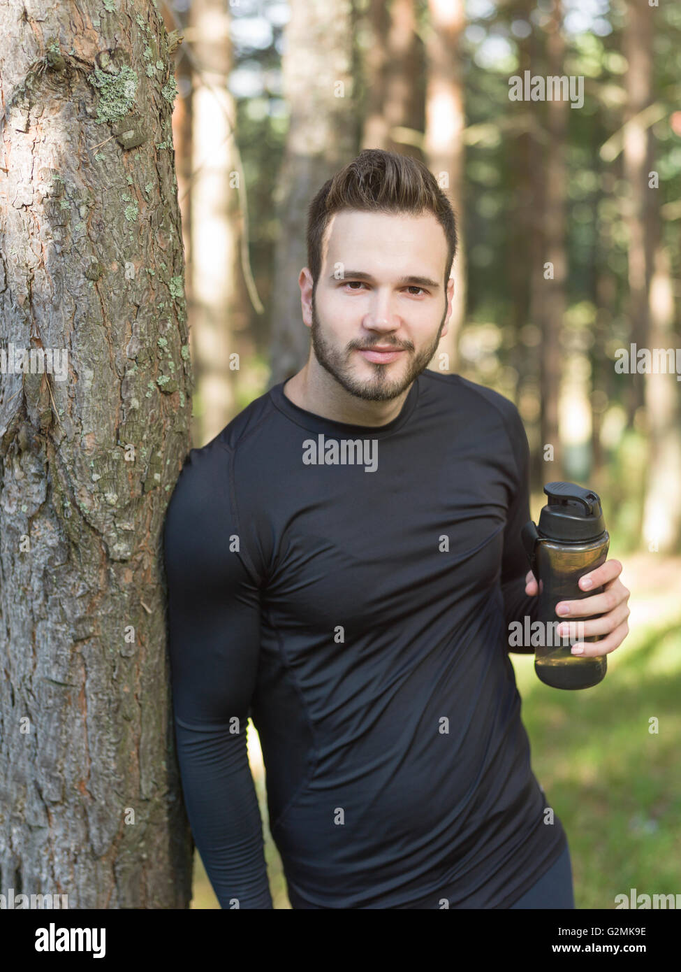 Handsome muscular fit young man hi-res stock photography and images - Alamy
