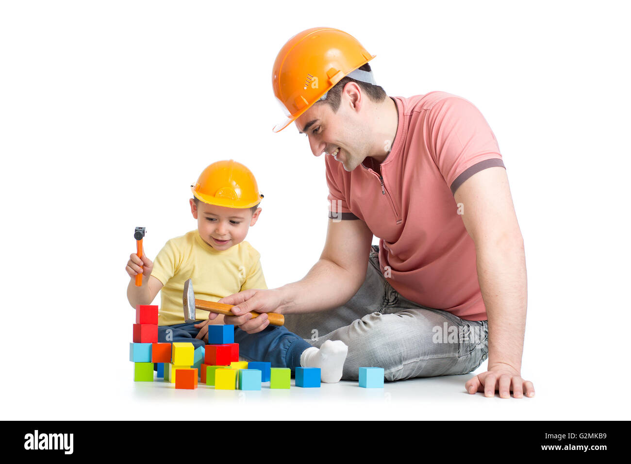Child and his dad playing game together Stock Photo