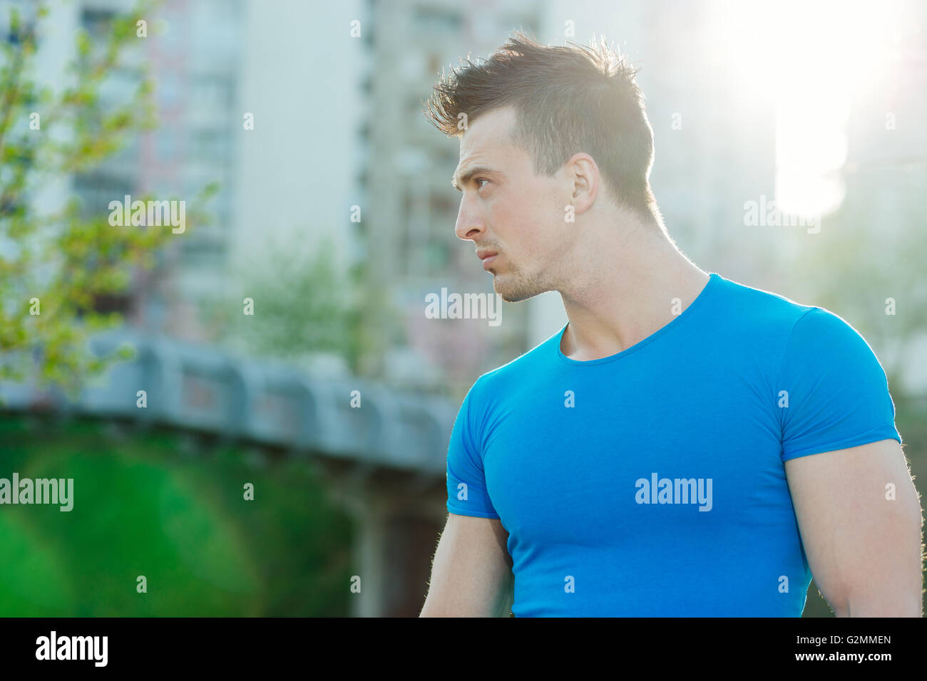 Male Runner Exercising On Suburban Street Stock Photo - Alamy