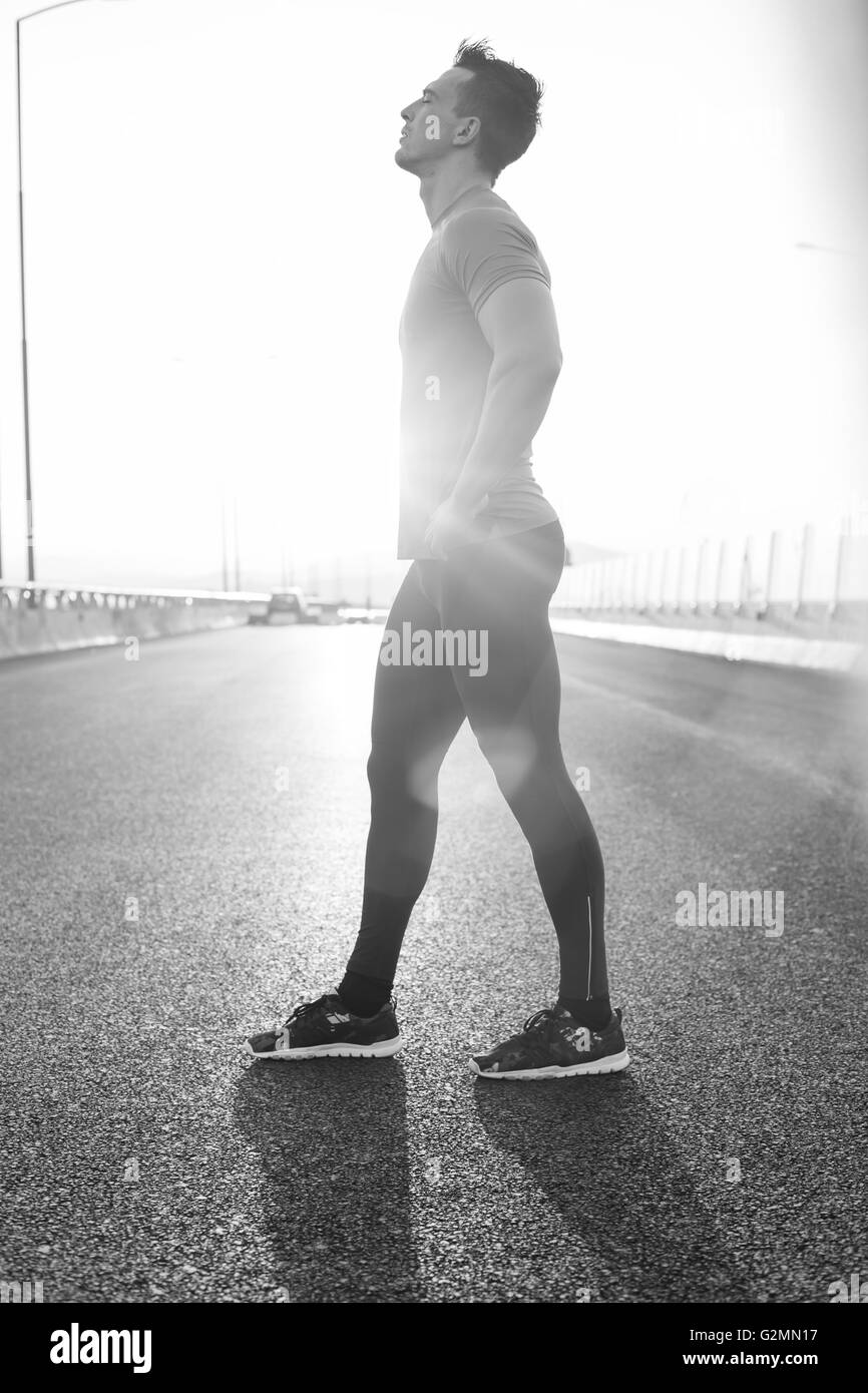 Running man. Male runner at sprinting speed training for marathon