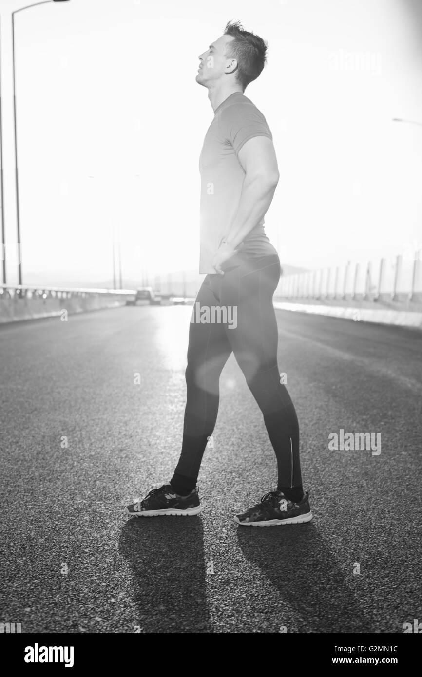 Running man. Male runner at sprinting speed training for marathon