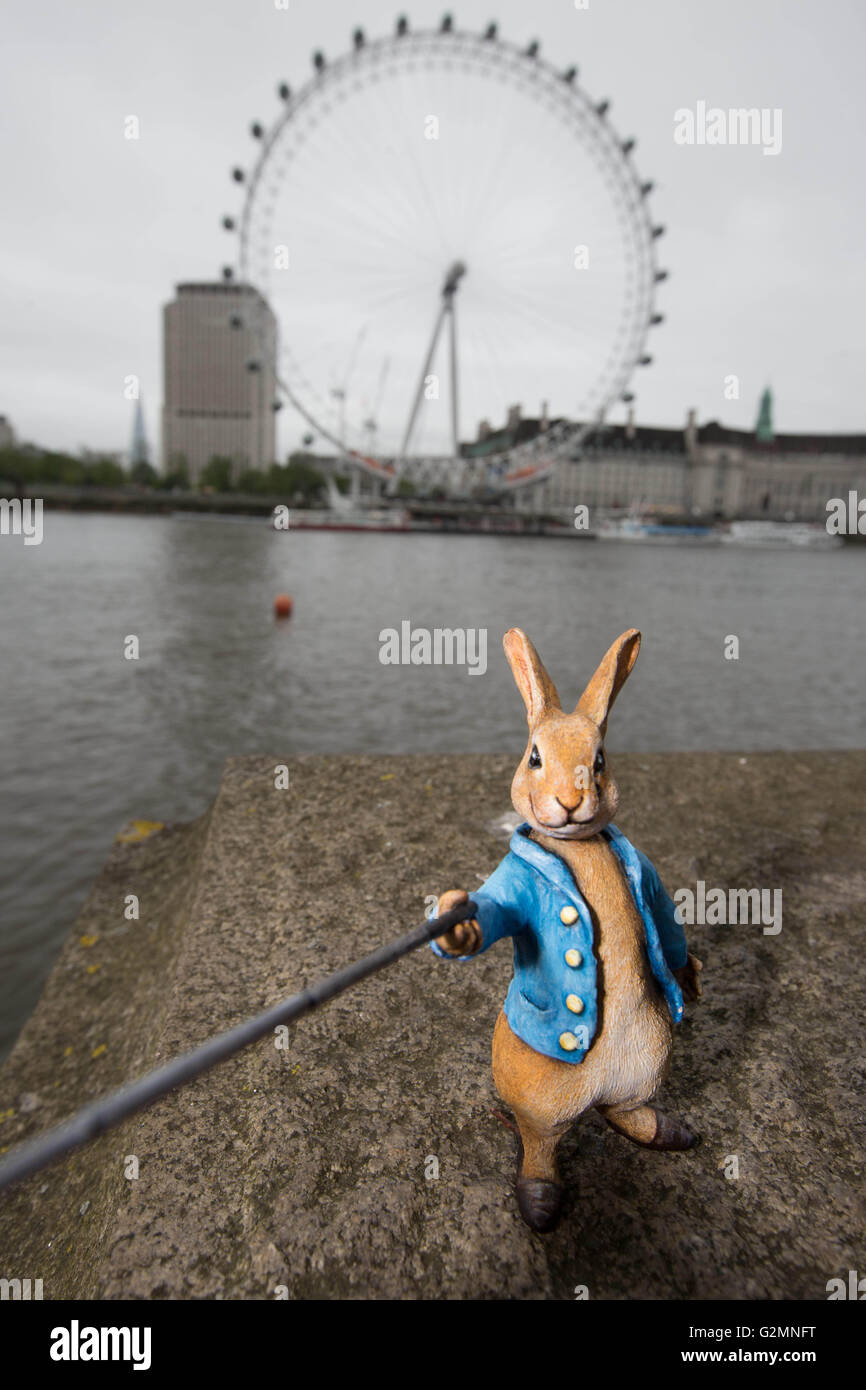 A miniature sculpture of Beatrix Potter character Peter Rabbit taking a ...