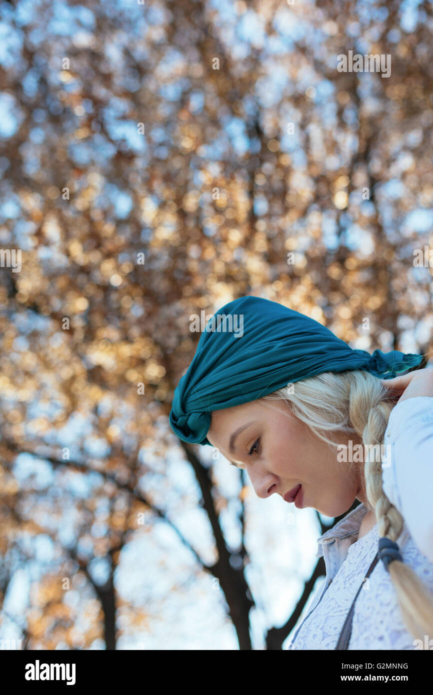 Portrait of beautiful woman in blooming tree in spring Stock Photo - Alamy