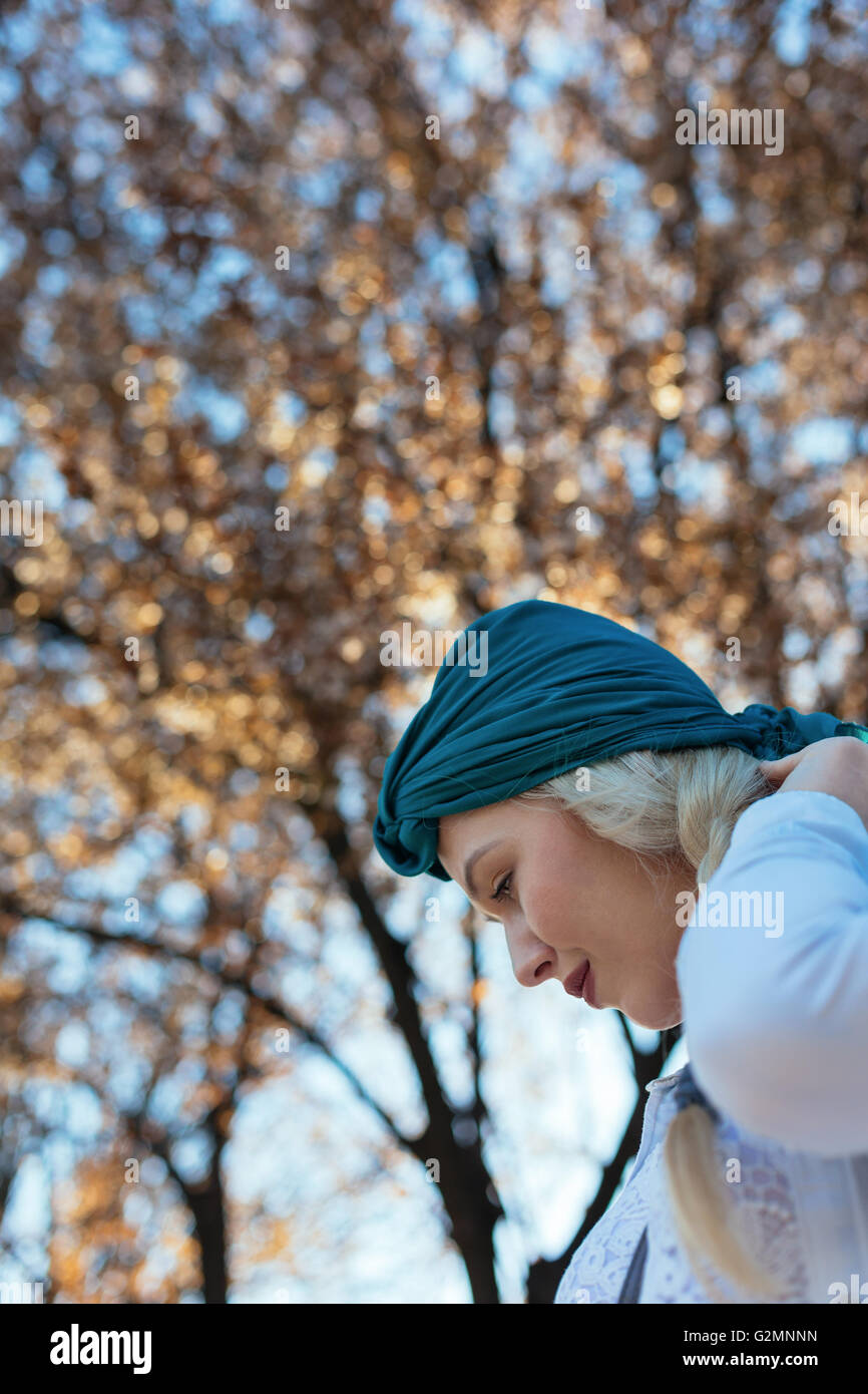 Portrait of beautiful woman in blooming tree in spring Stock Photo - Alamy