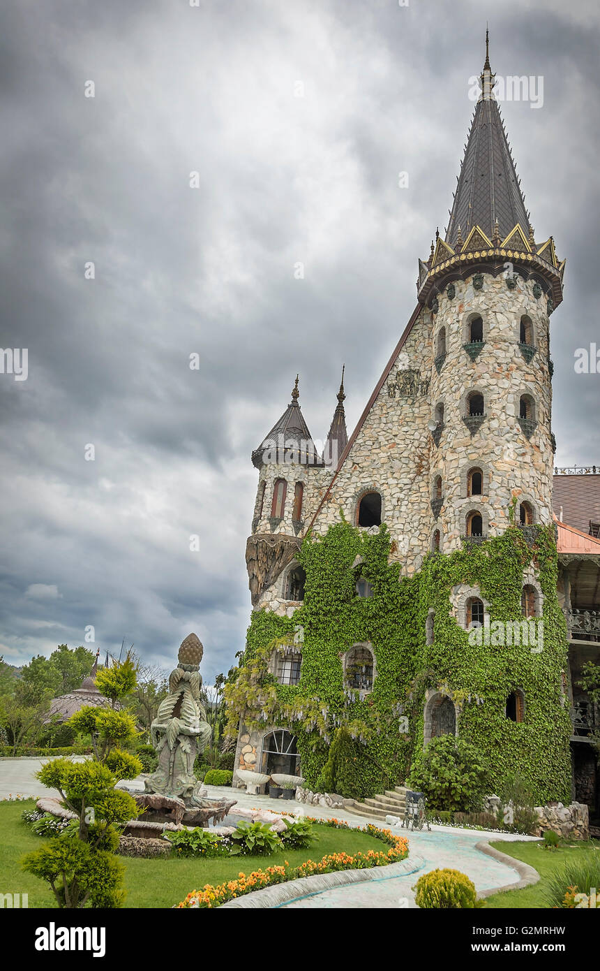 Castle tower on the background of a stormy sky. Stock Photo