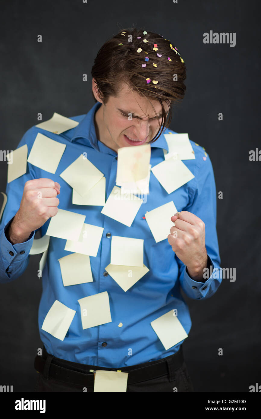Presenter Using Yellow Note Man covered in yellow notes Stock Photo - Alamy