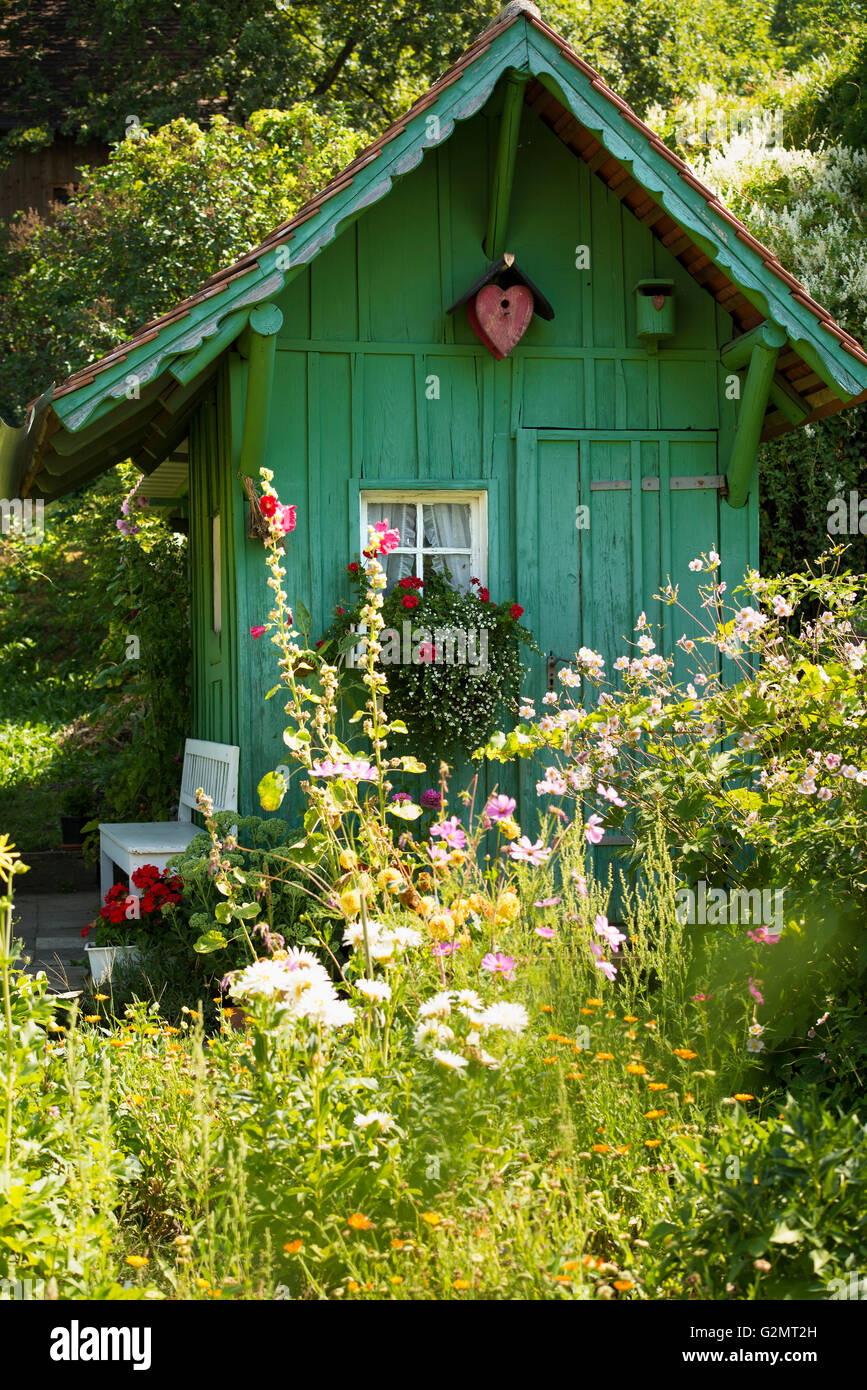 Garden shed and summer flower garden, Meersburg, Lake Constance, Baden-Württemberg, Germany Stock Photo