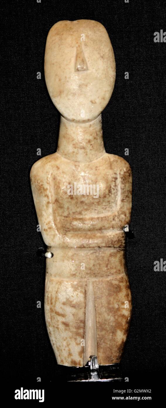 Limestone female figure, possibly late Neolithic 4500-3200 BC. From Karpathos. This figure has some features in common with Cycladic figurines. Stock Photo