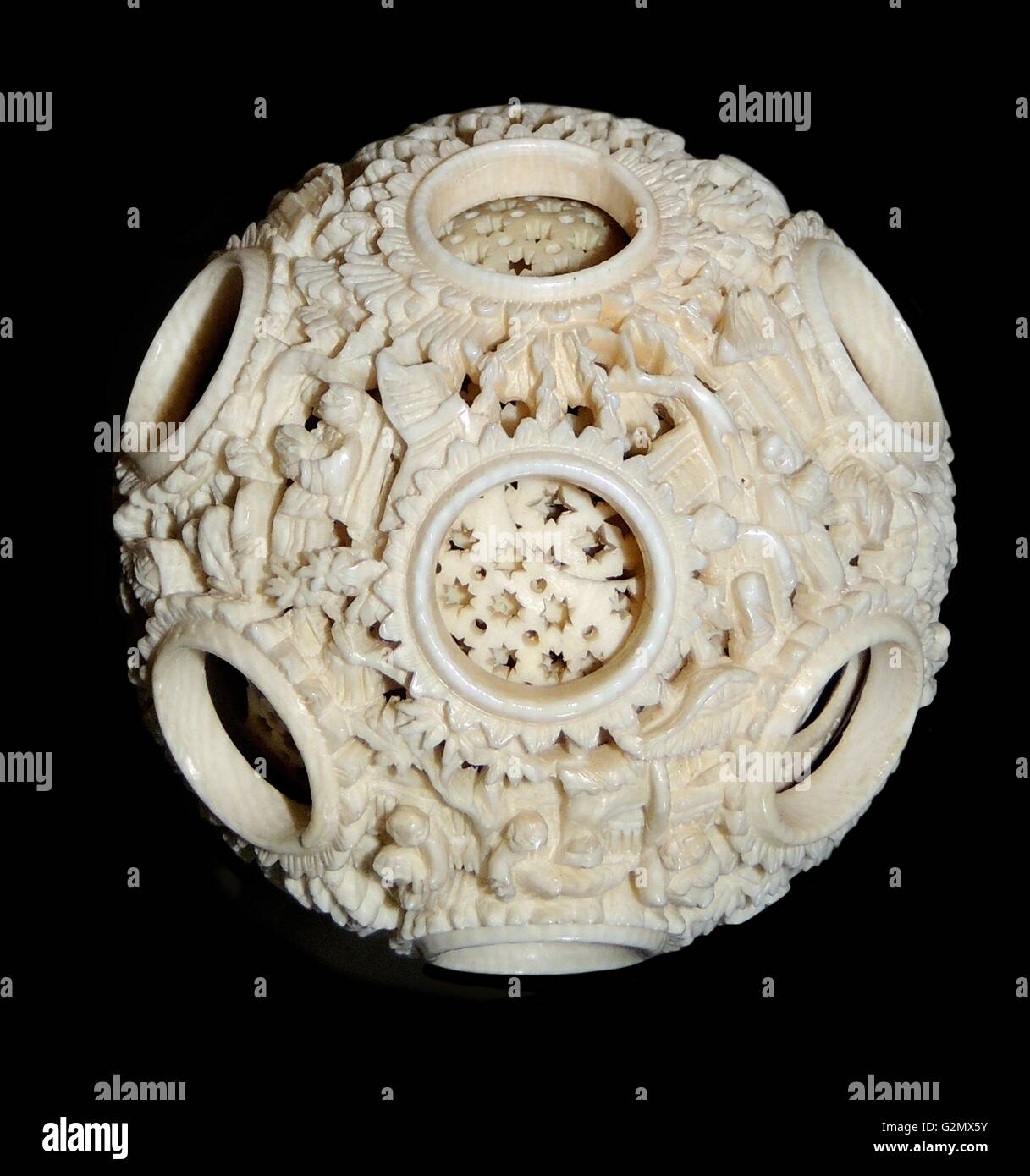 Carved ivory ball, composed of 12 freely moveable concentric spheres. Qing dynasty, 19th century AD. During this period the craftsmen were obsessed with exploring their technical limits and ivory provided a particularly suitable medium for this. Stock Photo