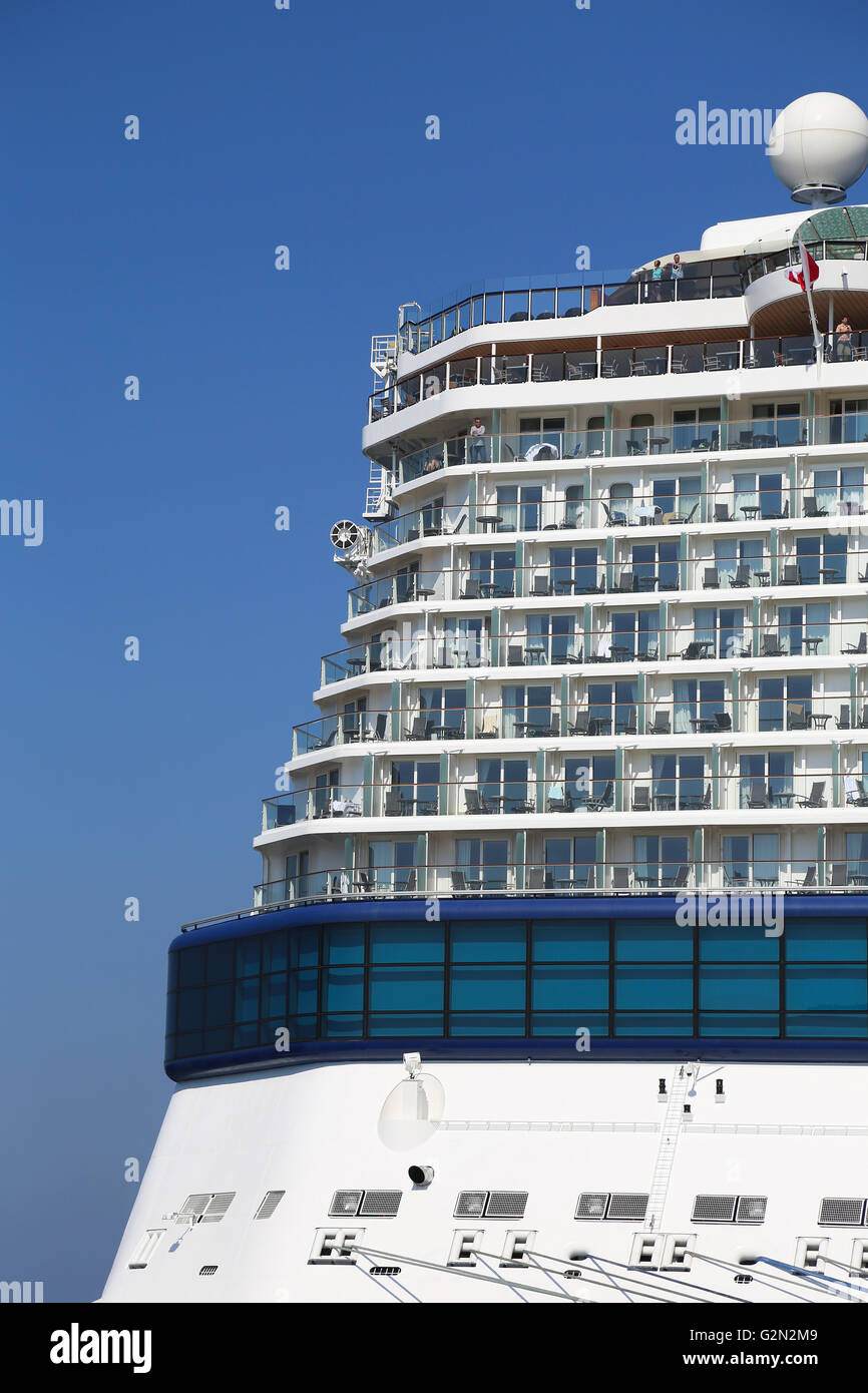 The Celebrity Reflection cruise ship moored in the Mykonos Harbor Stock Photo