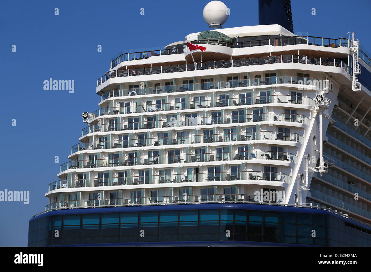 The Celebrity Reflection cruise ship moored in the Mykonos Harbor Stock Photo