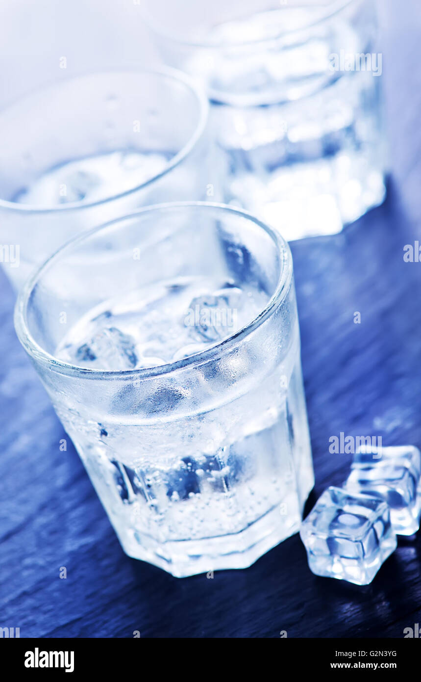 cold water with ice cubes in the glass Stock Photo - Alamy