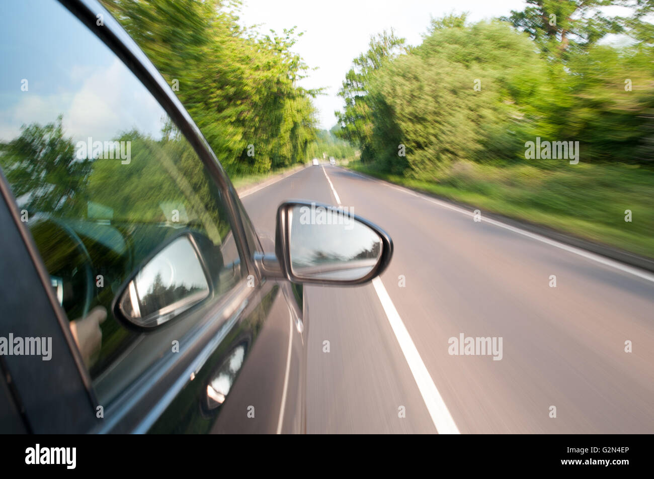 Blurred highway scene from a car window Stock Photo - Alamy